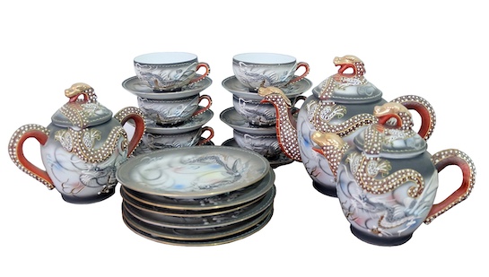 A set of fifteen vintage Japanese Dragon Teaset circa 1950’s consisting of two teapots, a sugar pot, six cake plates and six pairs of tea cups and plates