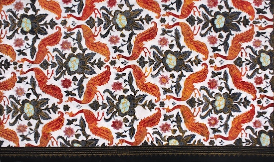 A pattern of bright red peacock with a dark blue flower pattern