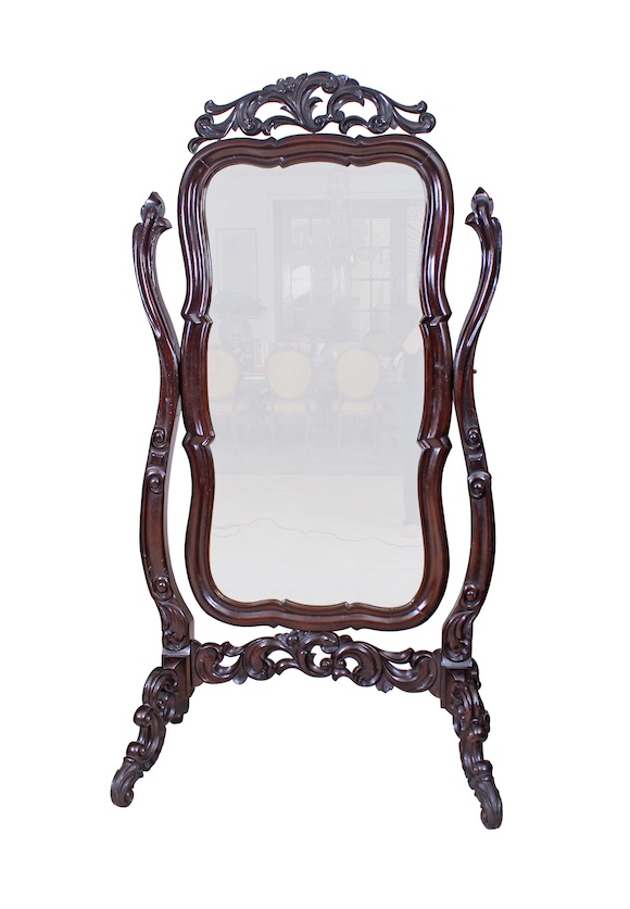 A 20th century carved teak cheval mirror