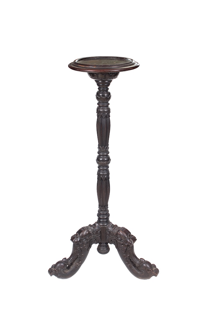 A carved teak pot stand