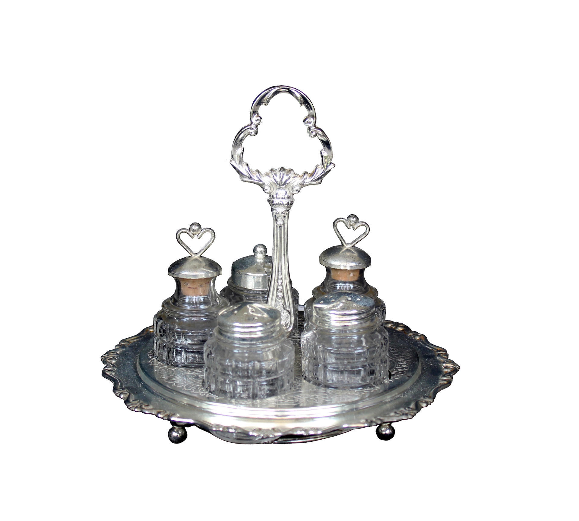 A silver plated condiment set with tray