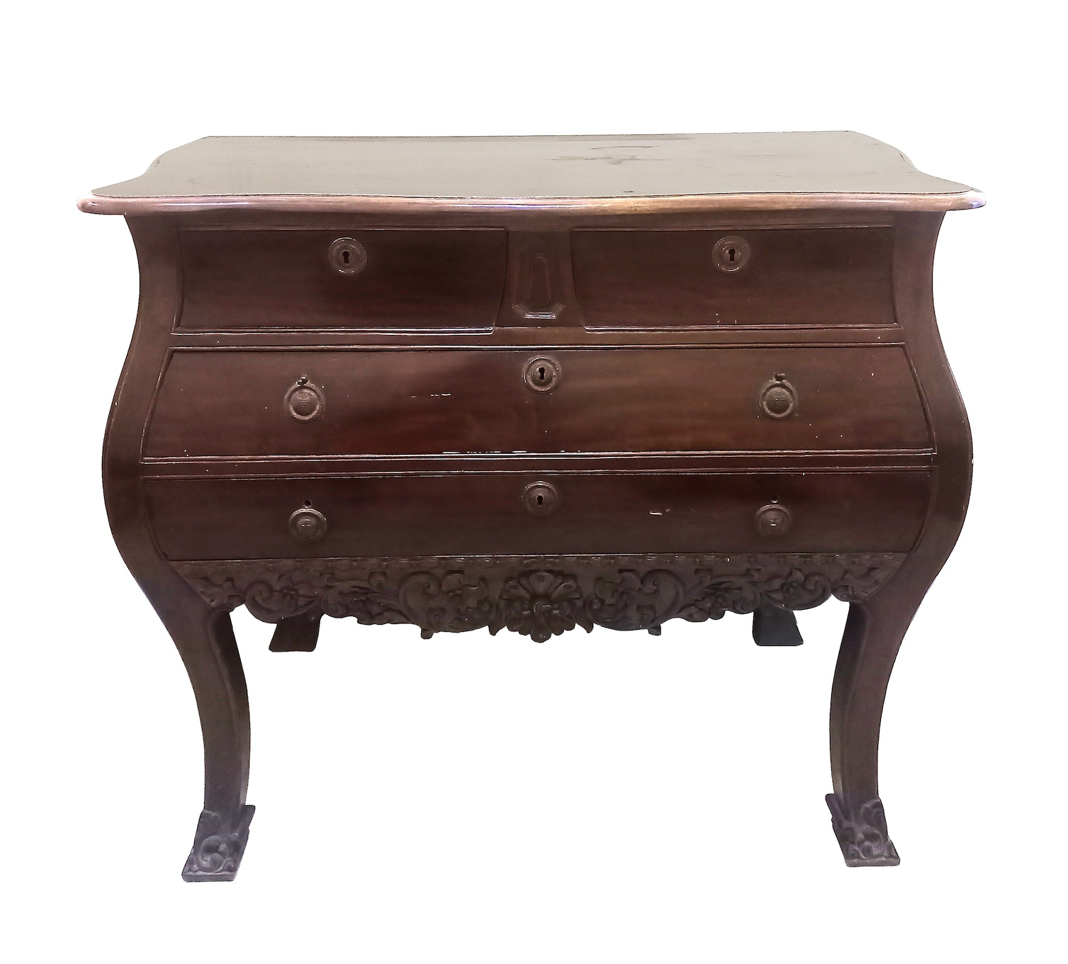 A 20th century carved teak commode with four drawers