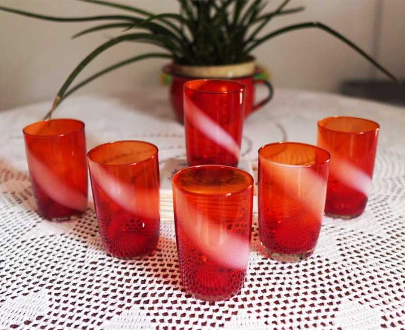 A set of six vintage glasses of red with white gradations