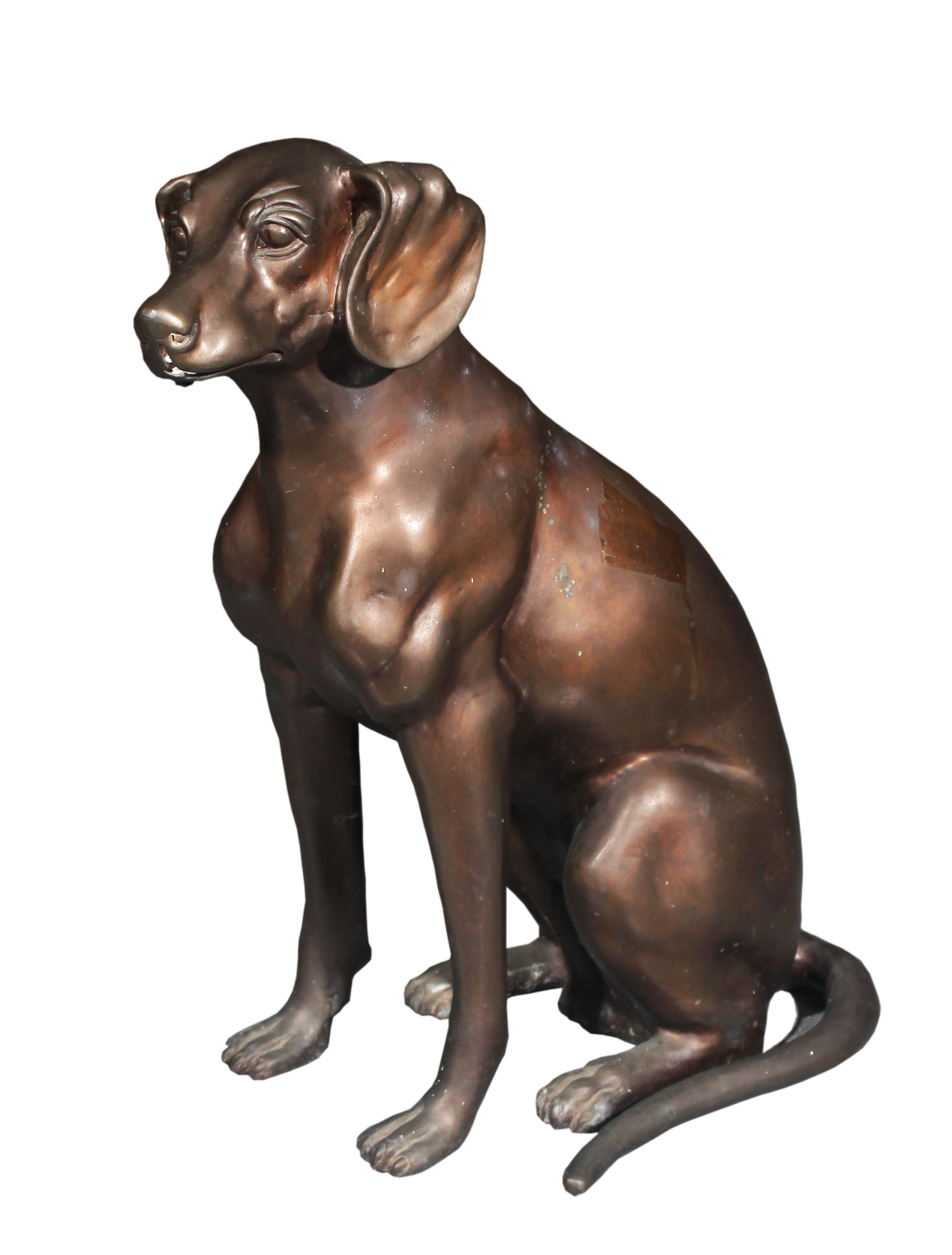 An iron sculpture depicting a dog.