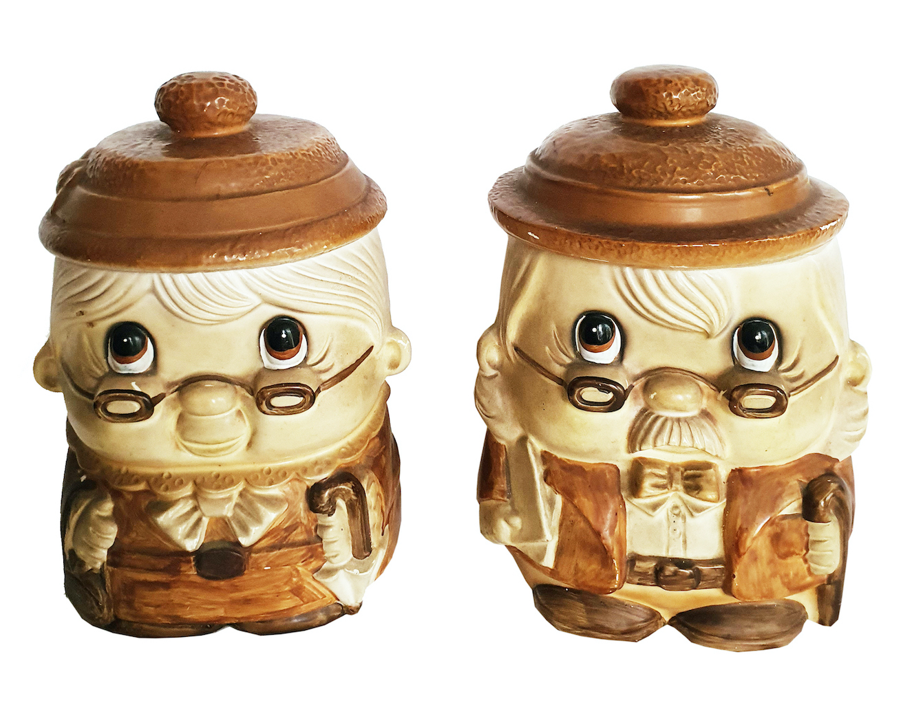 A pair of ceramic cookie jar, depicting an old couple, with lid