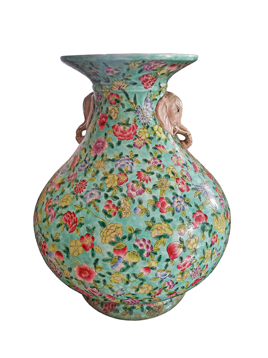 A Chinese vintage turquoise ground famille rose mille fleur pear shaped vase