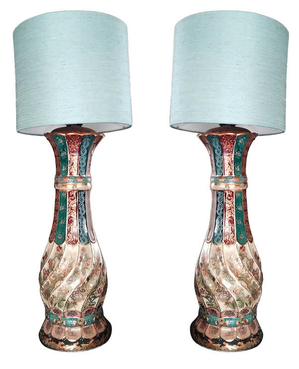 A pair of table lamps with ceramic vase stands and lamp shades