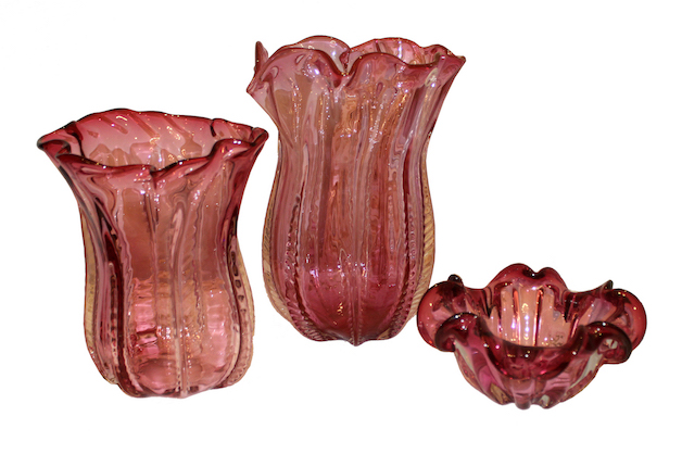 A set of three vintage European cranberry glass consisting of two vases and bowl