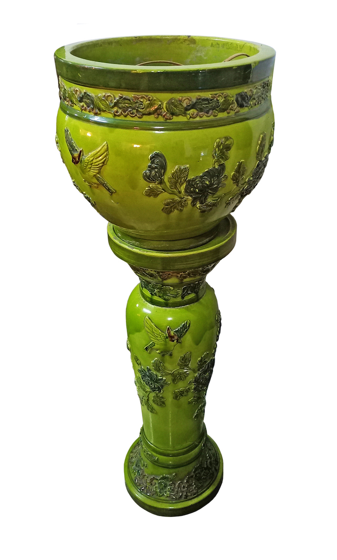 A majolica polychrome ceramic pot and stand