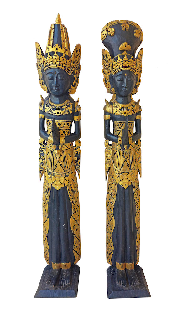 A pair of carved wood model of Guardian with gilt
