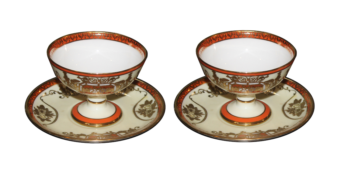 A pair of Japanese Noritake cups and stands