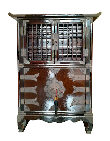 A 20th century Korean wood cabinet with brass mounts