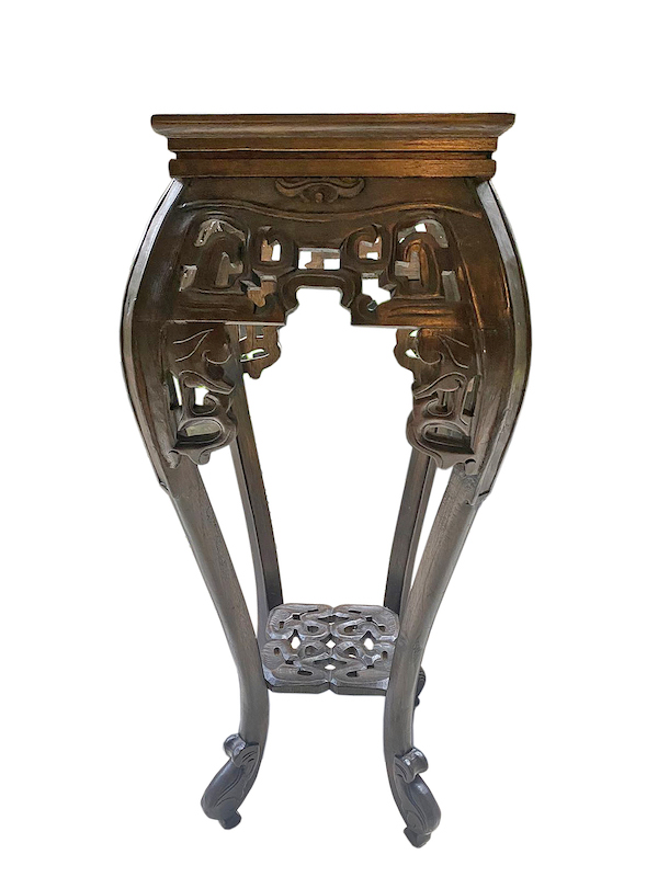 A modern carved teak Chinese style pot stand