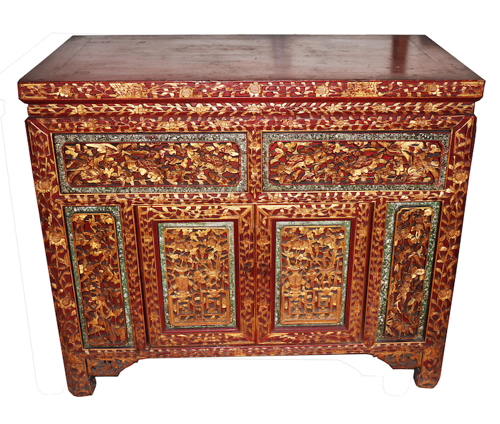 A late 19th - early 20th century Peranakan Chinese carved red and gold bridal sideboard