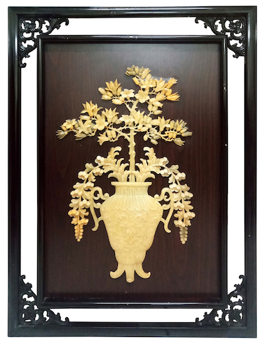 A 20th century Chinese wood panel mounted with frame as wall plaques decorated with soapstone