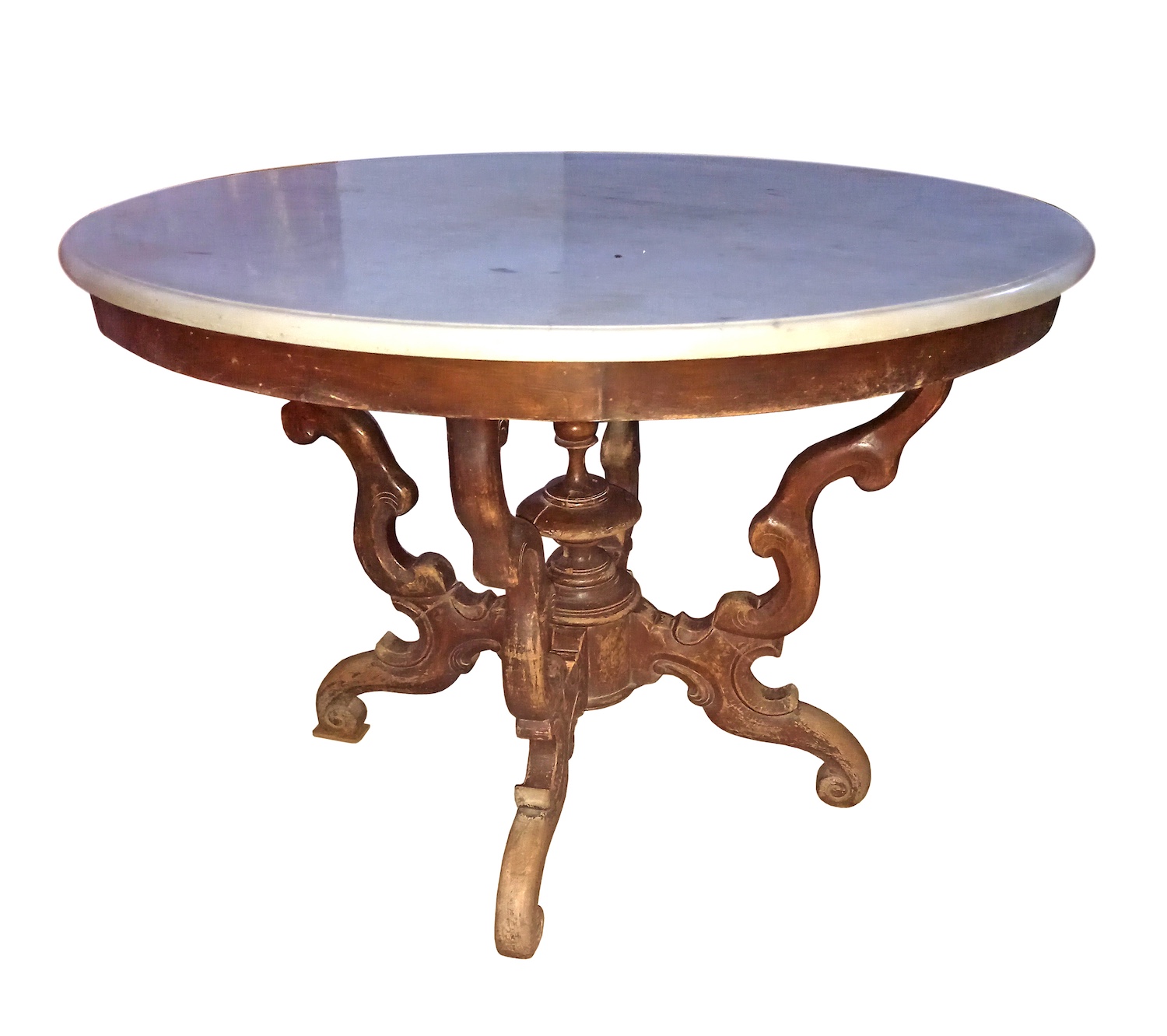 A late 19th - early 20th century carved teak table with marble top