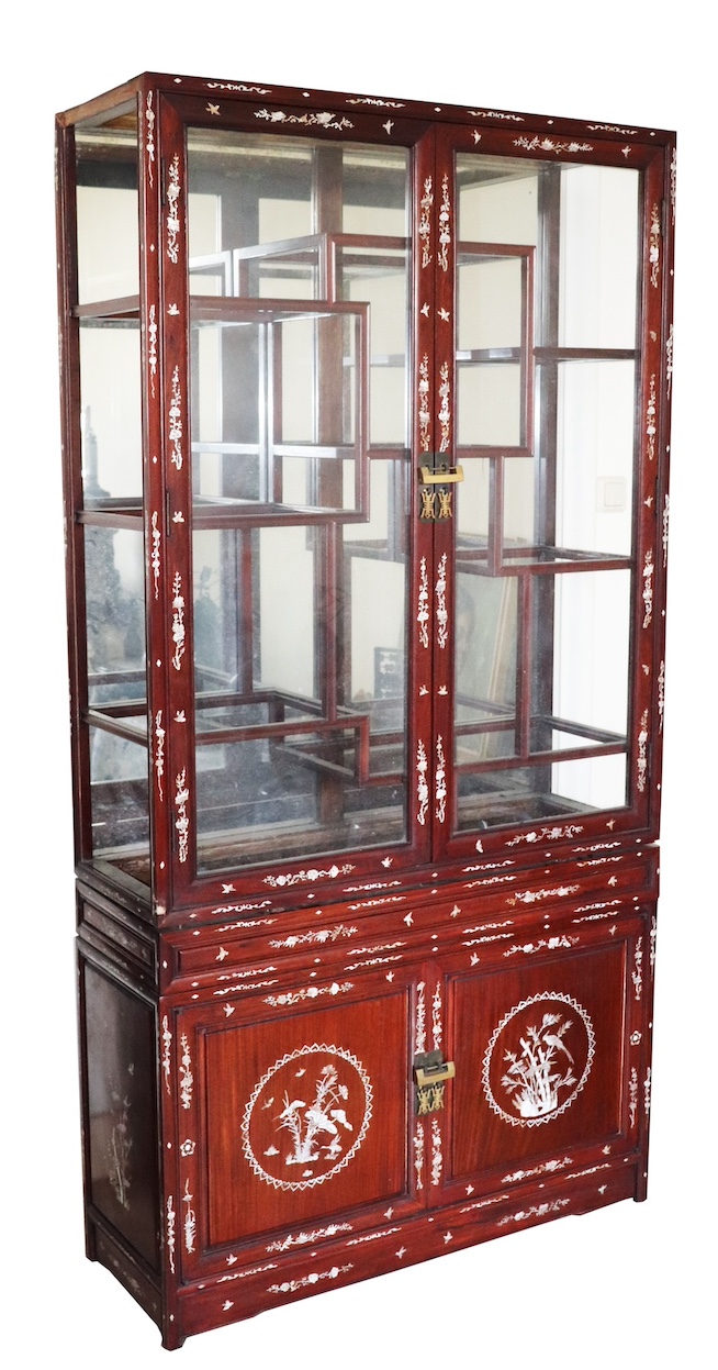 A Chinese rosewood display cabinet decorated with mother of pearl inlay