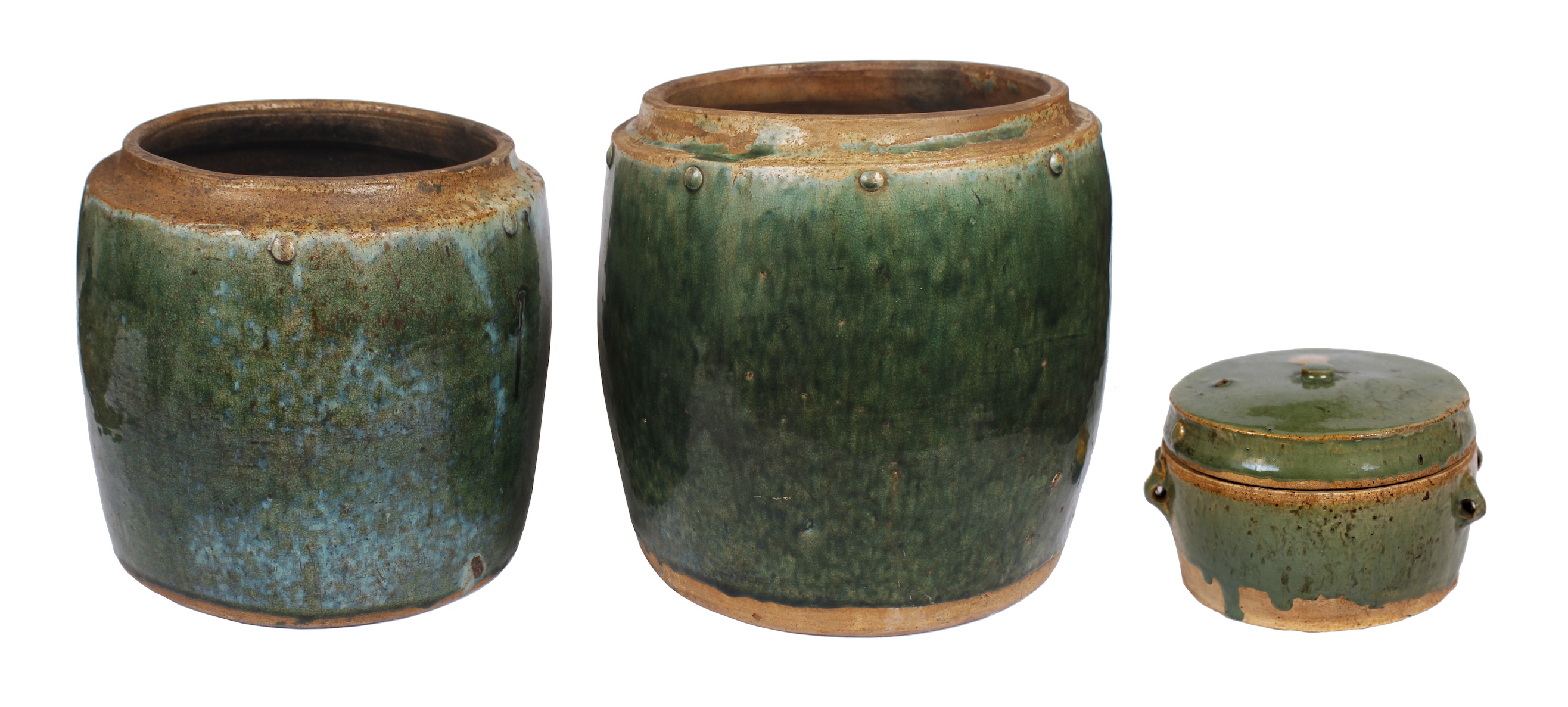 A group of three of Late Qing to early 20th century Shiwan green jars