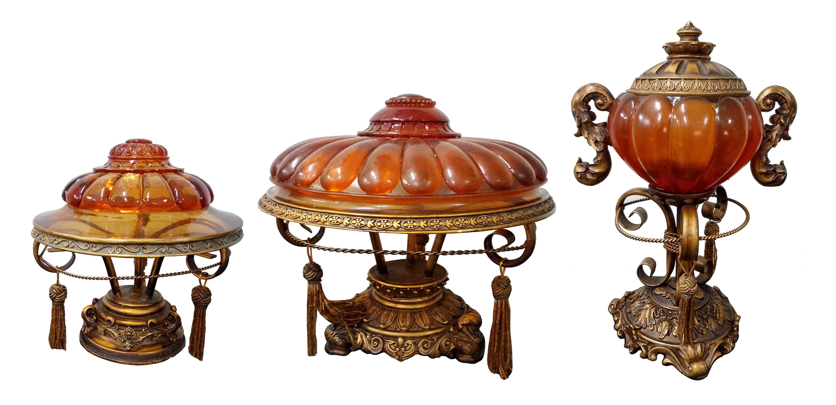 A group of three gilt brass ormolu style table decoration