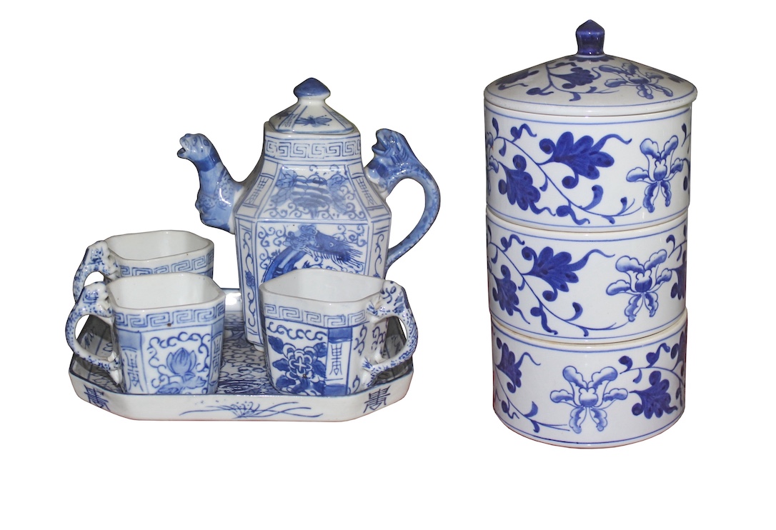A group of six pieces blue and white ceramics, consisting of a tea pot, three cups, a tray and three-tier food container