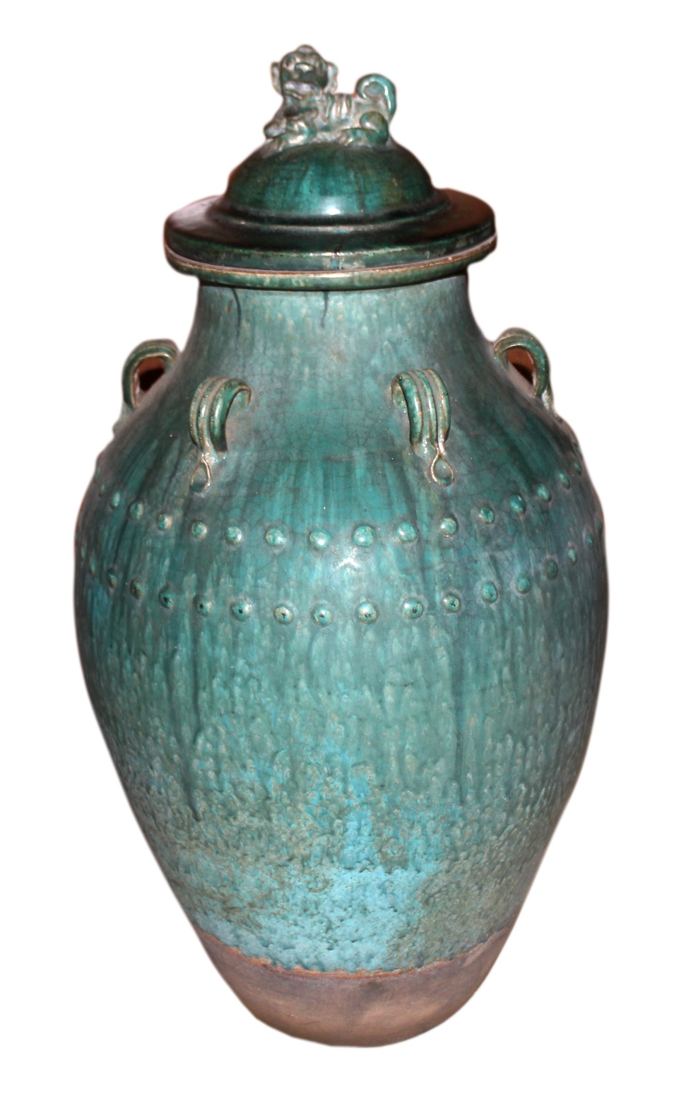 A Qing 19th century Chinese Shiwan ware green glazed storage jar with cover