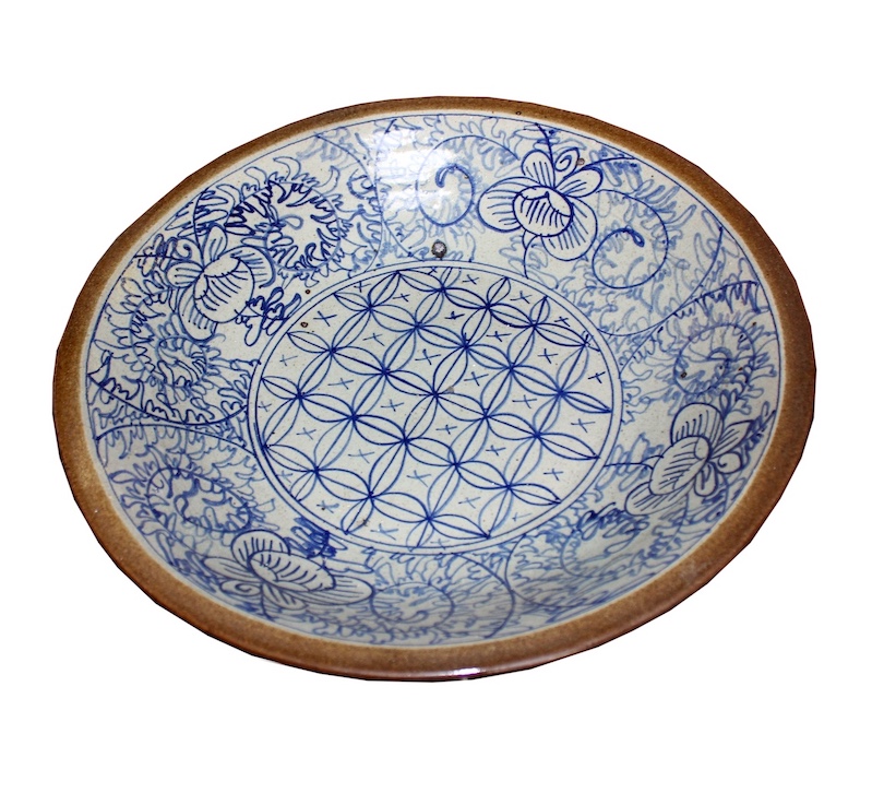 A 19th - 20th century blue and white Chinese basin with cafe au lait exterior