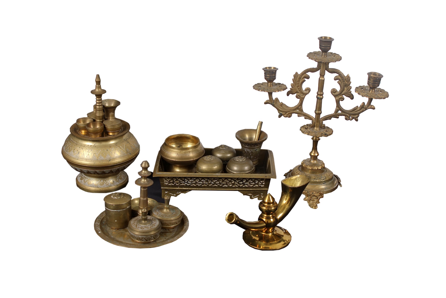 A group of 20th century of brass consisting of betel set, spittoon, candelabra and horn shape oil lamp