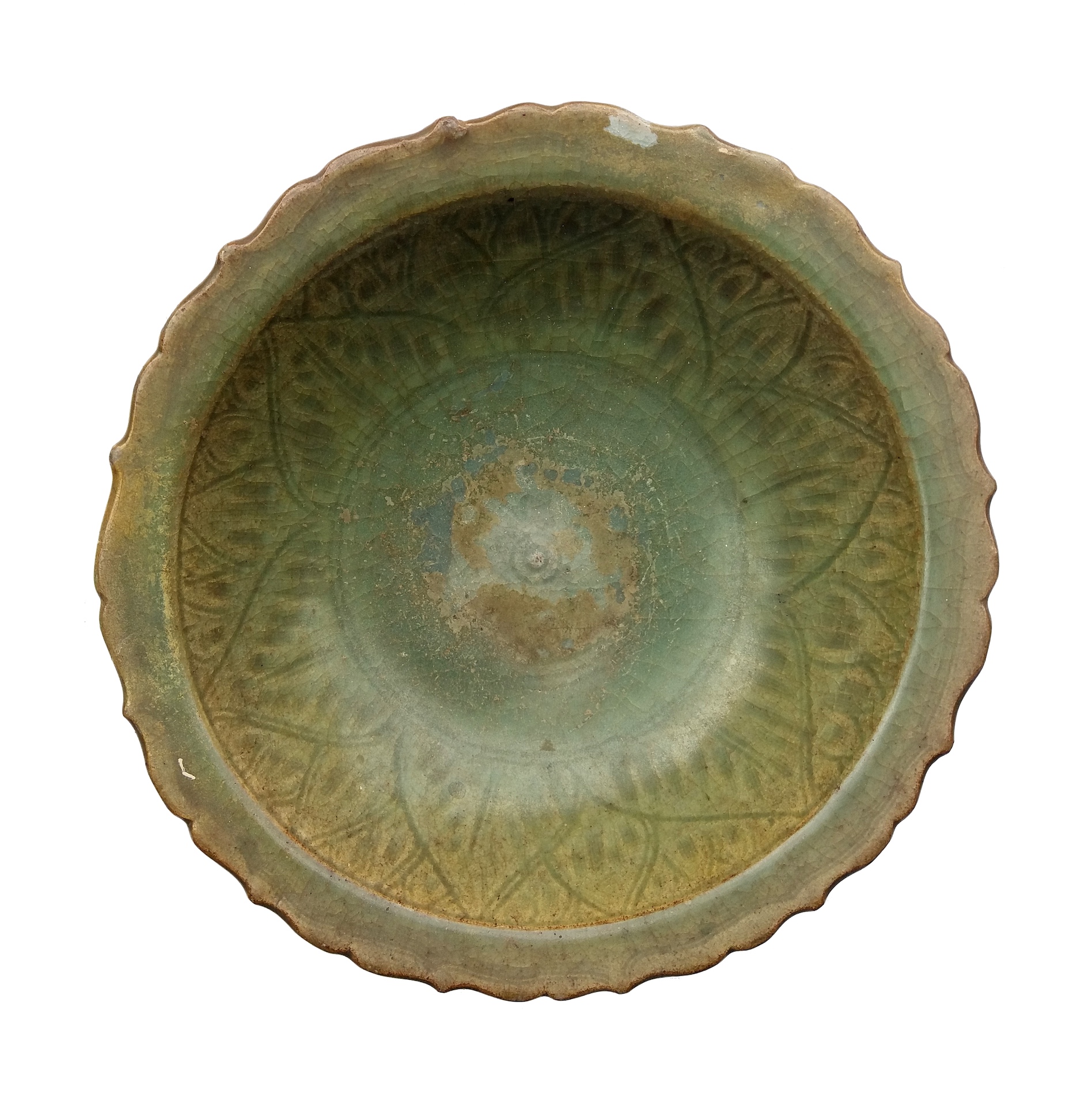 A 14th - 16th century Thai Sawankhalok foliated bowl celadon with incised decoration