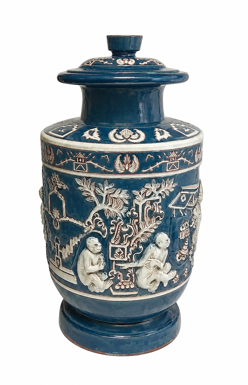 A 20th century polychrome ceramic vase with relief decoration
