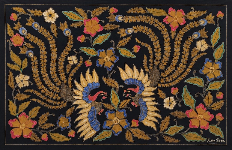 A late 20th century Batik wall decoration by Iwan Tirta with pair of flying birds motif