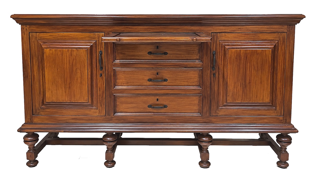 A wooden teak sideboard with three drawers and a tray serving top middle