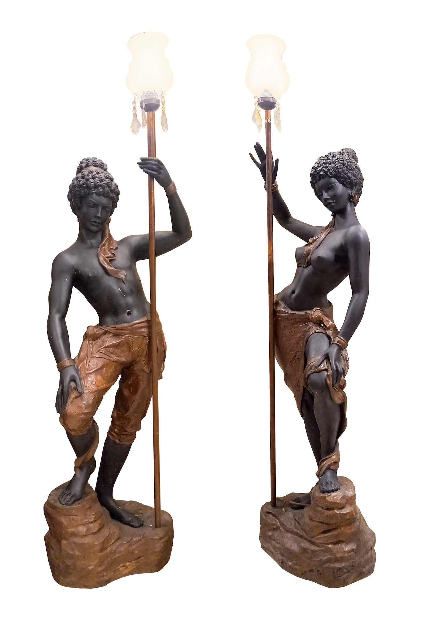 A pair of light stands in the form of European figurines