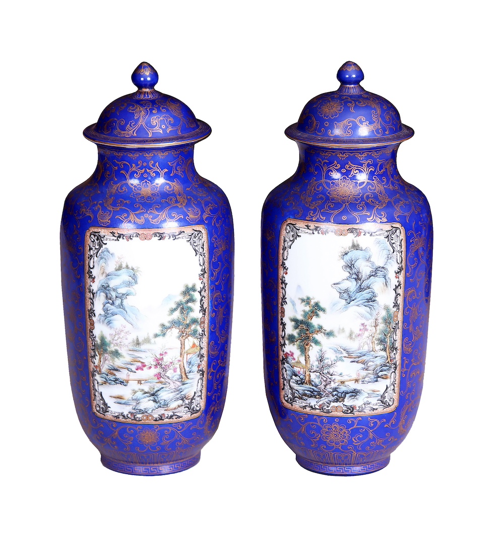 A pair of modern Chinese blue glazed covered painted with panels of landscape in enamels and gilt