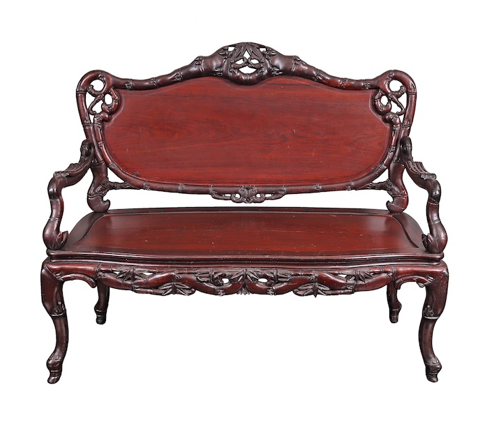 A 20th century Vietnamese carved rosewood sofa