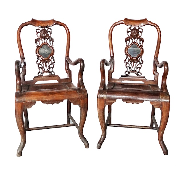 A pair of 20th century hardwood armchairs with marble inset